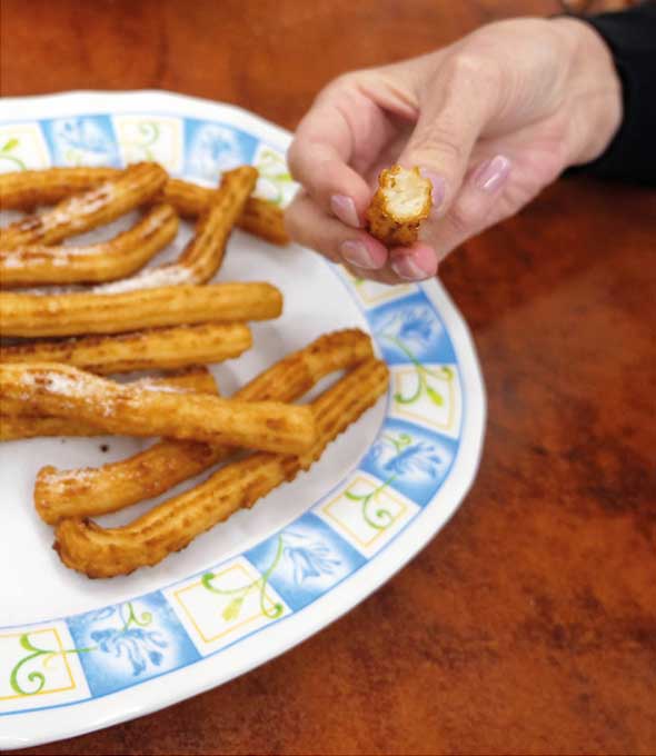 Churros auf Teller